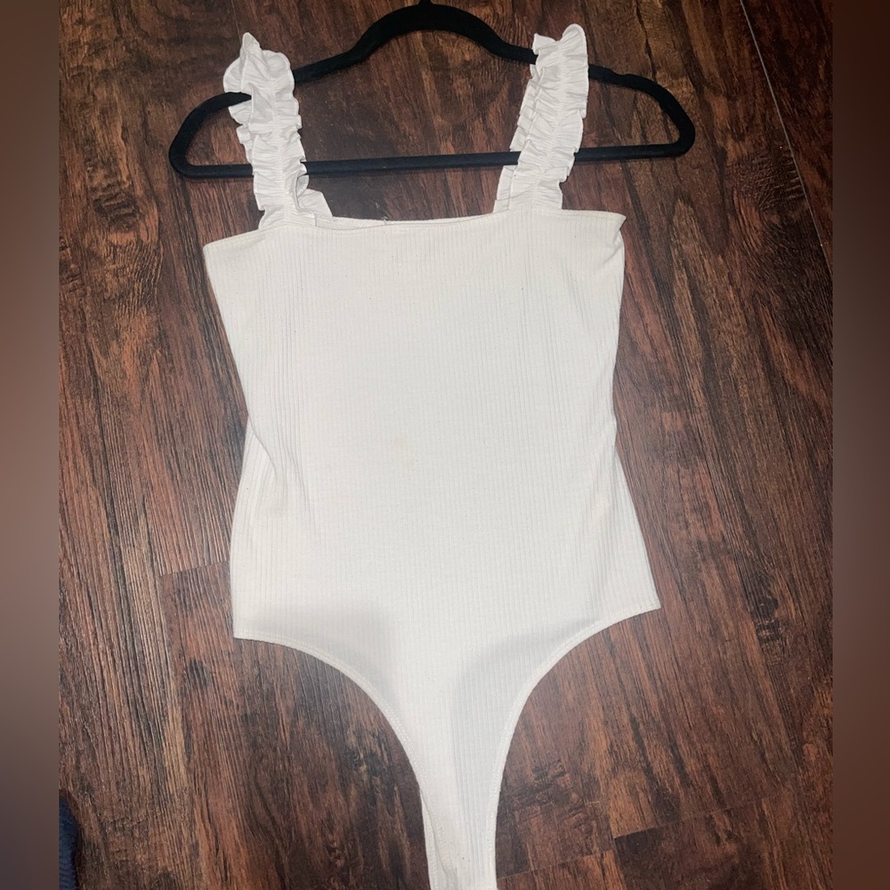 White ruffle bodysuit